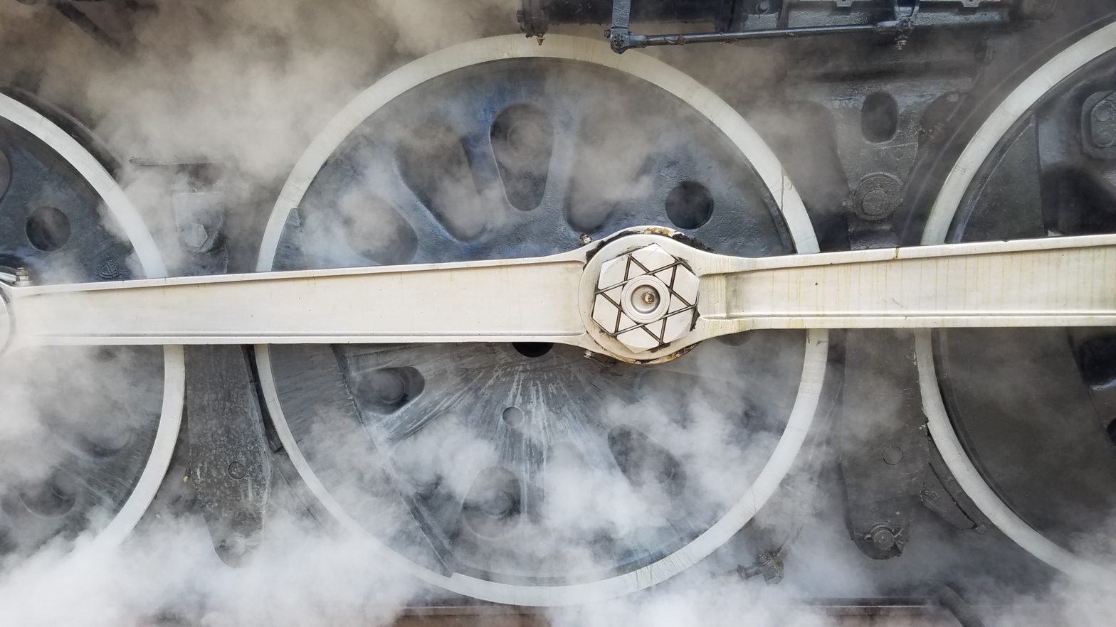 Train wheels and steam